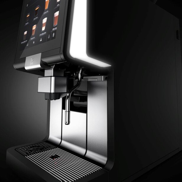 Elegantní kávovar WMF 1500S Plus s intuitivním dotykovým displejem a nerezovými prvky, ideální pro milovníky kávy.