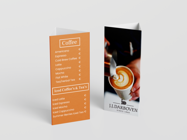 Trifold menu showcasing coffee and iced beverages from J.J. Darboven, featuring latte art and pricing details.