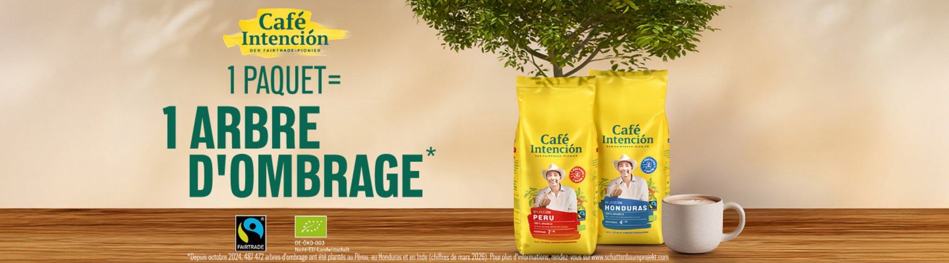 Sacs Café Intención avec un arbre et une tasse de café, promouvant le développement durable et les initiatives de culture de café Fairtrade.