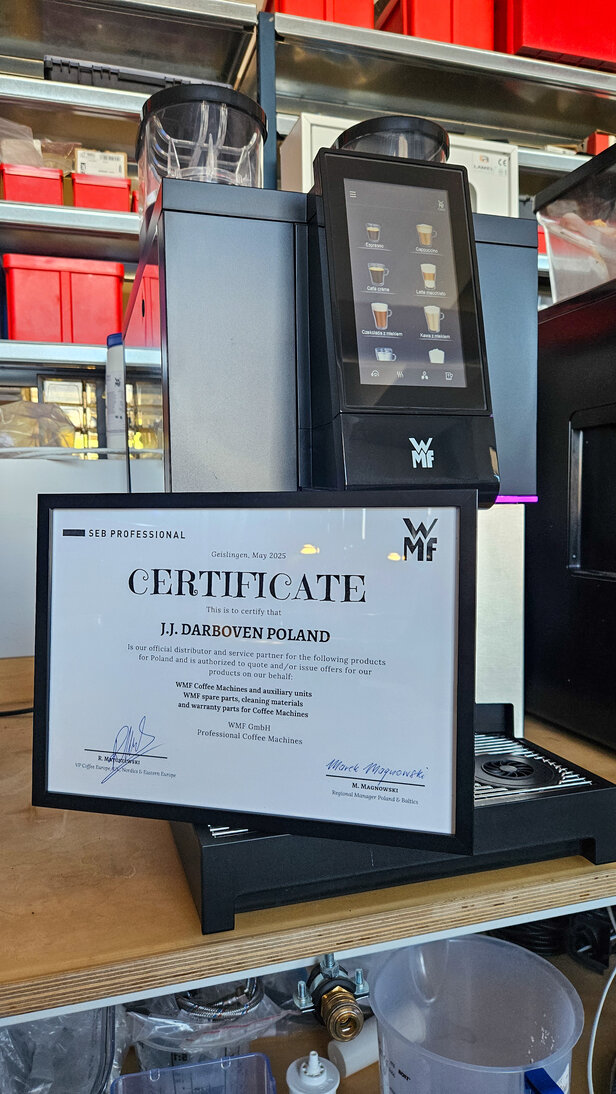 Certyfikat na ekspres do kawy WMF dla J.J. Darboven Poland, potwierdzający partnerstwo w zakresie profesjonalnych produktów i usług kawowych.