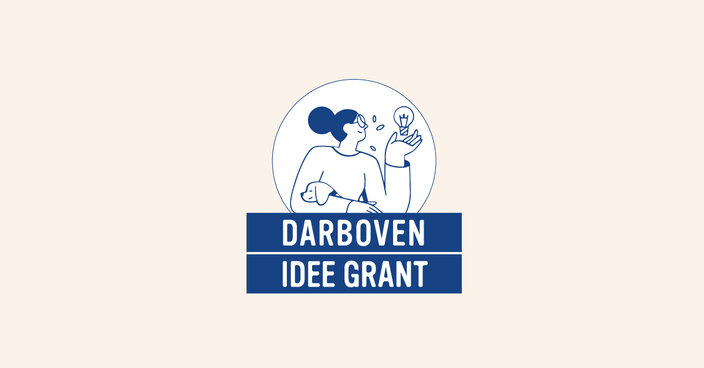 Logo Darboven Idee Grant przedstawia kobietę z żarówką i psem, symbolizując kreatywność i innowacyjność.