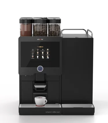 Samoobsługowy ekspres do kawy Schaerer Coffee Soul z podwójnym młynkiem i modułem proszkowym, idealny dla entuzjastów kawy.