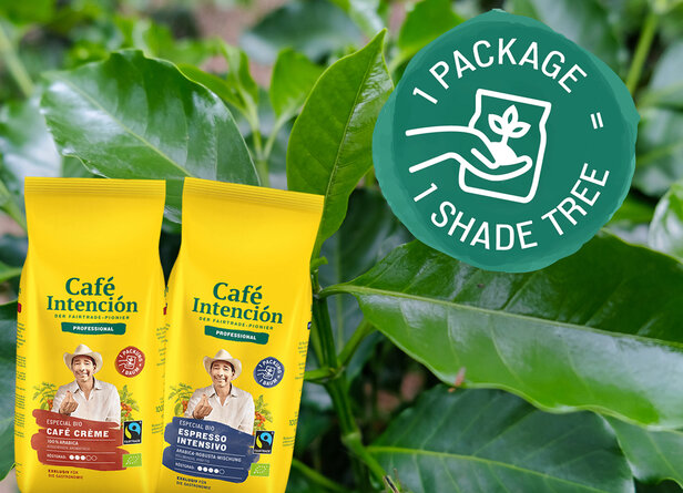 Café Intención coffee packs showcasing sustainable Fairtrade practices with "1 package = 1 shade tree" commitment.