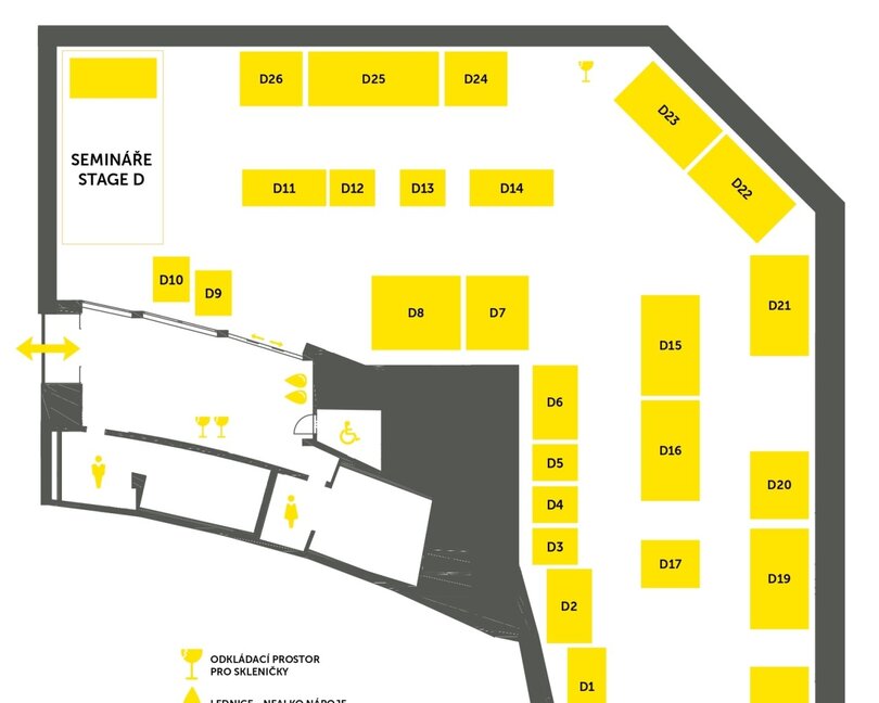 Půdorys pavilonu D s vyznačením prostor pro semináře a míst k sezení pro akce. Přehledné uspořádání s očíslovanými sekcemi.