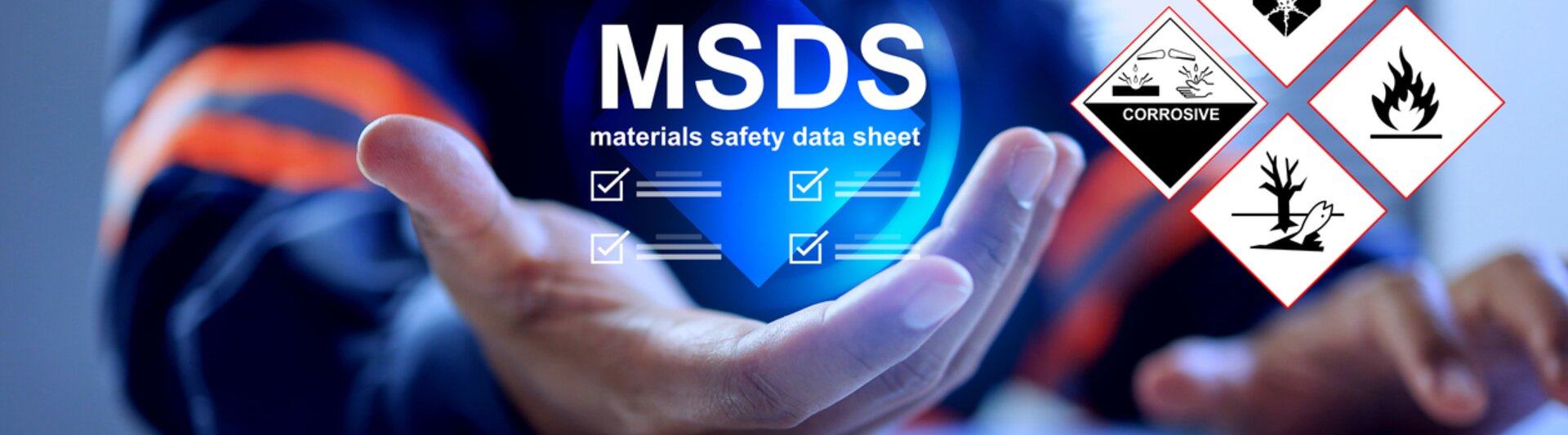 Ręczne wyświetlanie MSDS (Material Safety Data Sheet) wraz z symbolami zagrożeń, podkreślając protokoły bezpieczeństwa w miejscu pracy.